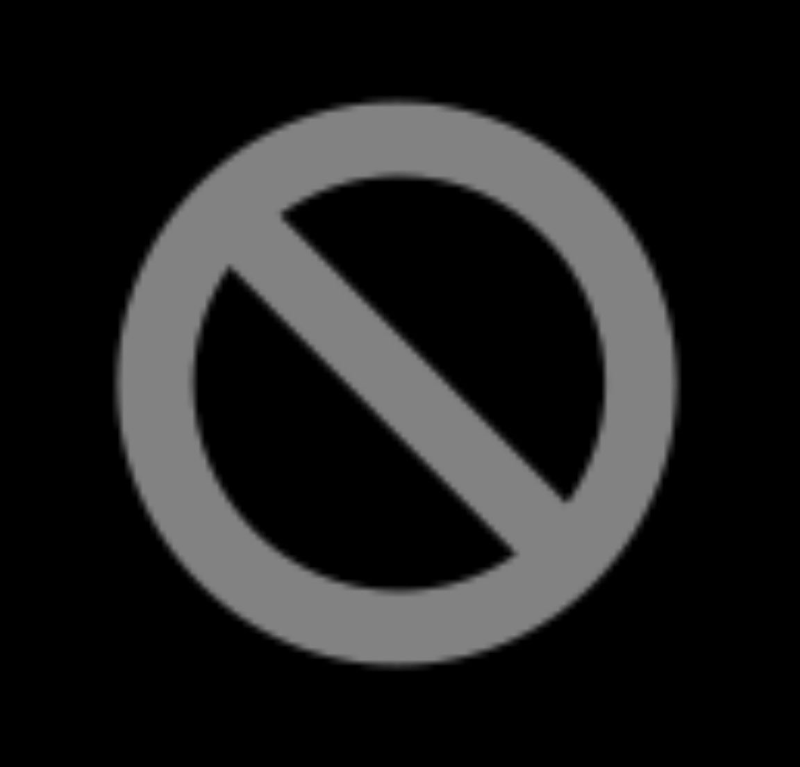 Gray prohibitory symbol, a circle with a line through it, on a black screen during the first restart without the USB installer.