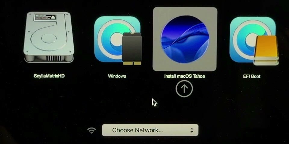 Startup picker on a 2013 MacBook Pro showing the internal drive, Windows, Install macOS Tahoe and EFI Boot icons.