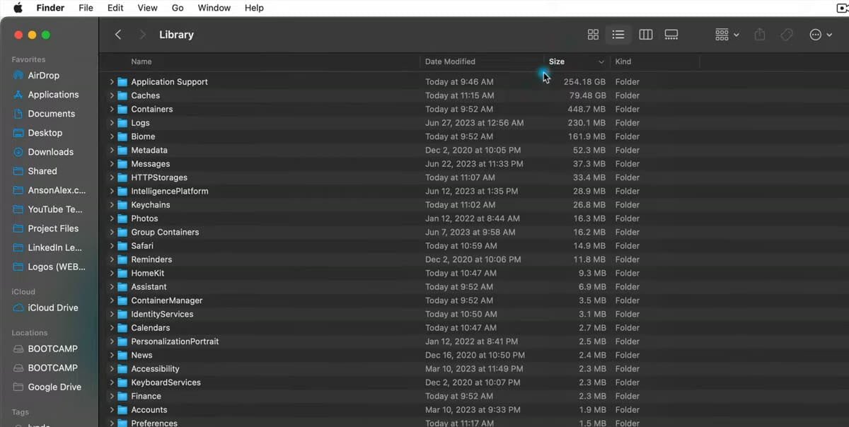 User Library in Finder showing Application Support, Caches, Containers, and Preferences folders.